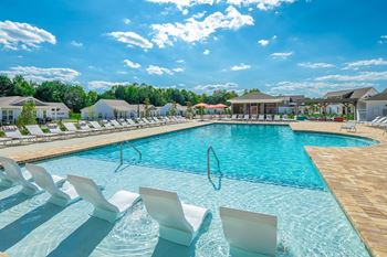 our apartments have a resort style pool with lounge chairs